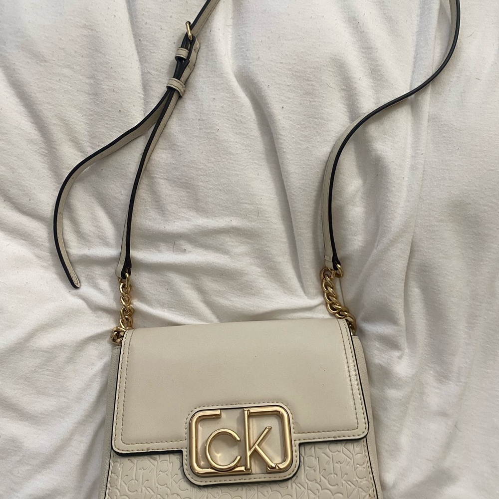 Calvin Klein Cream Crossbody Bag with Adjustable Strap and Gold Clasp